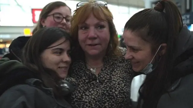 Clare met Diana and Olena at the airport