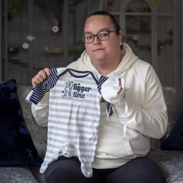 Hayley Matthews with the clothing that belonged to her son, Jack