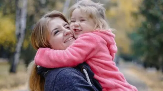 Yuliia Chernovil and her seven-year-old daughter Alisa