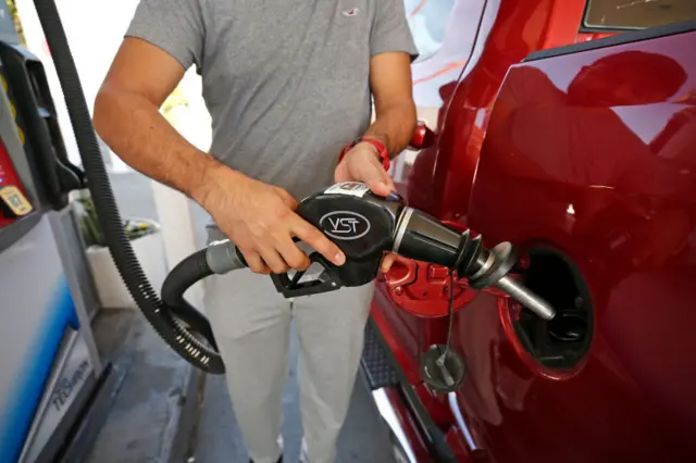 A man fuels his truck in Los Angeles.