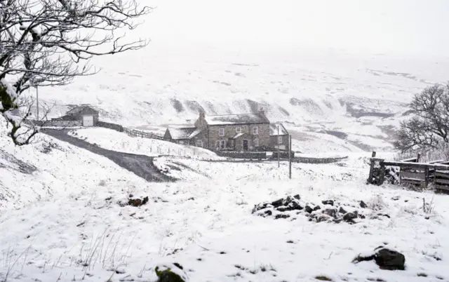 A cottage near Carrshield in Northumberland surrounded by snow