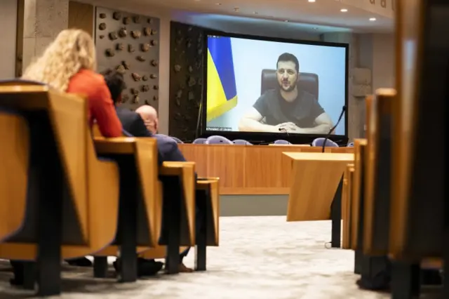 Volodymyr Zelensky gives a speech in the House of Representatives via a video link in The Hague, The Netherlands, 31 March 2022. T