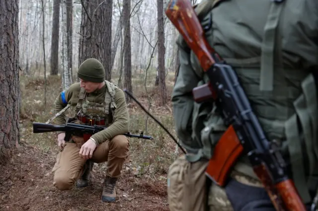 Ukrainian servicemen near Kyiv