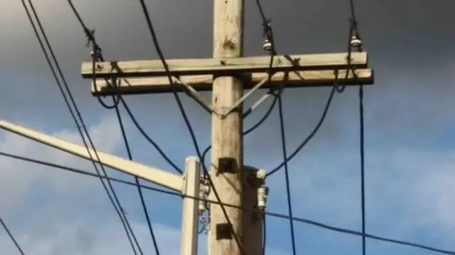 A wooden electrical pole