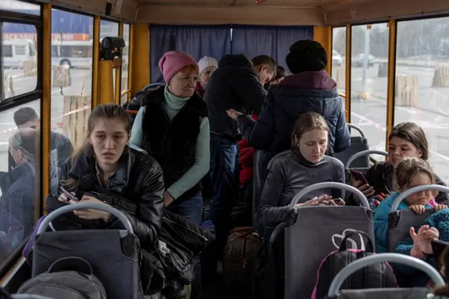 Evacuees from the Mariupol region arrive at a reception centre in Zaporizhzhia