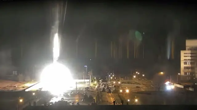 Surveillance camera footage shows a flare landing at the Zaporizhzhia nuclear power plant