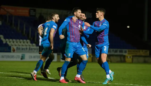 Kirk Broadfoot of Inverness Caledonian Thistle celebrates with teammates.