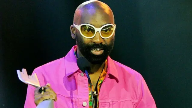 Riky Rick at an awards ceremony.