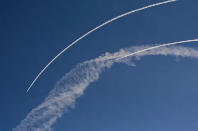 Contrails of military aircraft in the skies above Ukraine