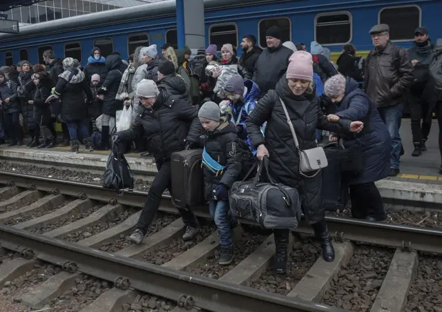 People on the tracks at Kyiv railway station