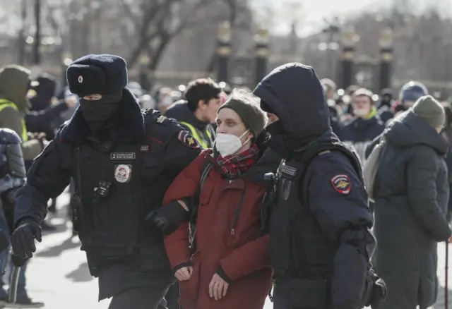 Police detain protestor in Moscow