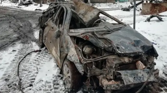 Damaged car in Kharkiv