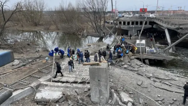 Makeshift bridge over Irpin river