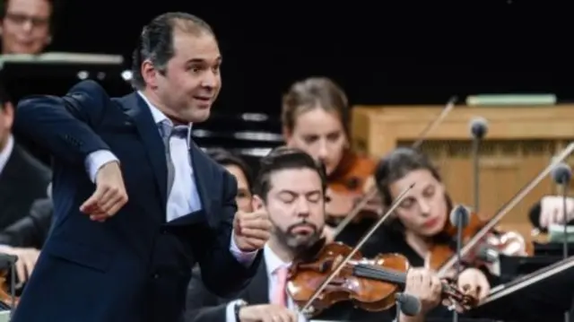 Tugan Sokhiev (L) conducted the Berlin Philharmonic orchestra in 2019