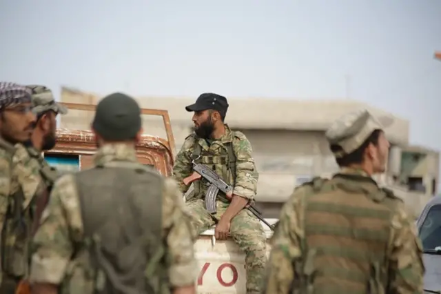 A Syrian soldier fighting during the civil war