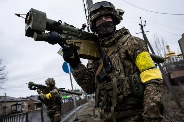 A Ukrainian soldier holds an anti-tank weapon