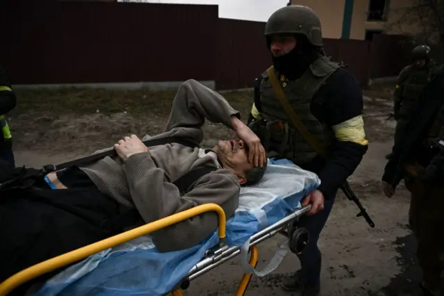 Injured Ukrainian man on a stretcher