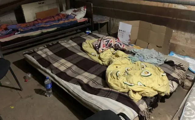 Beds in a basement in Sumy