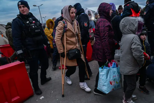 Civilians from Ukraine arrive at the Medyka border crossing due to ongoing Russian attacks on Ukraine, in Przemysl, Polan