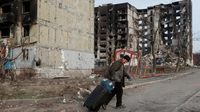 Man in destroyed city of Mariupol