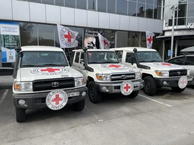 Red Cross vehicles prepare to head to Mariupol