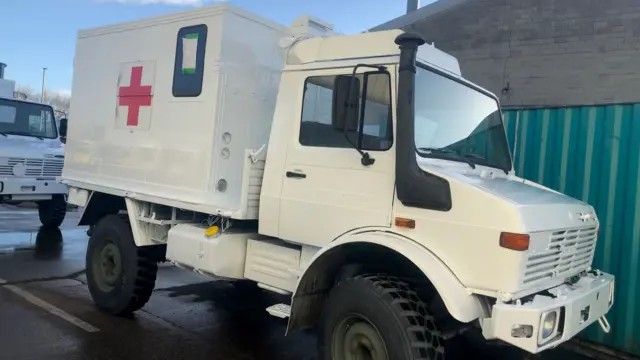 Picture of a military ambulance parked outside