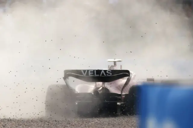 Carlos Sainz spinning on gravel