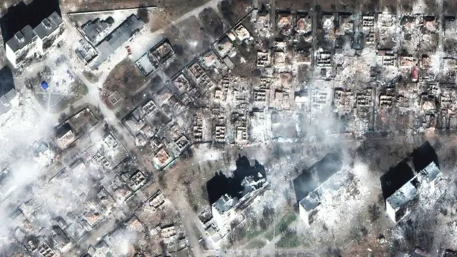 A bird's eye view of dozens of destroyed homes in Mariupol