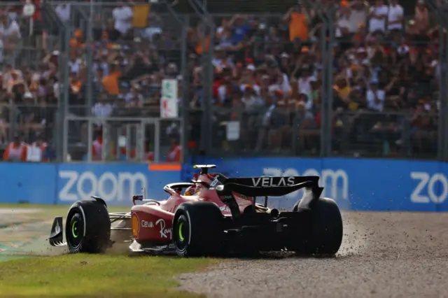 Carlos Sainz spinning on gravel