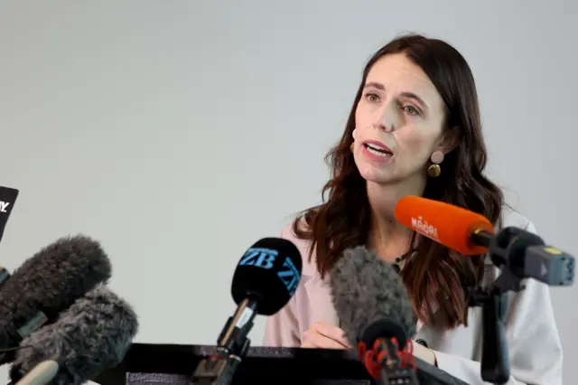 File photo of Jacinda Ardern speaking to reporters