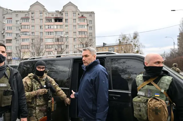 Austrian Chancellor Karl Nehammer visited the site of a mass grave in Bucha, near Kyiv, on Saturday