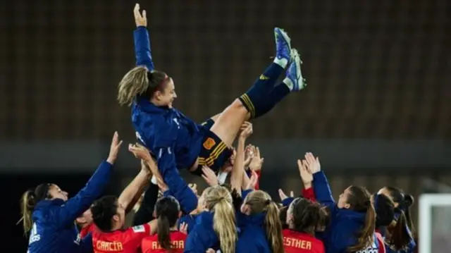 Alexia Putellas is congratulated by her Spanish team-mates the day after winning the Ballon d'Or