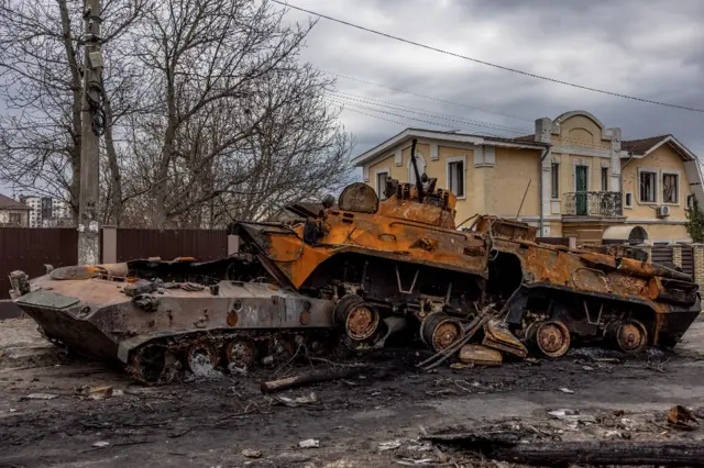 Destroyed Russian military machinery on the street in Bucha