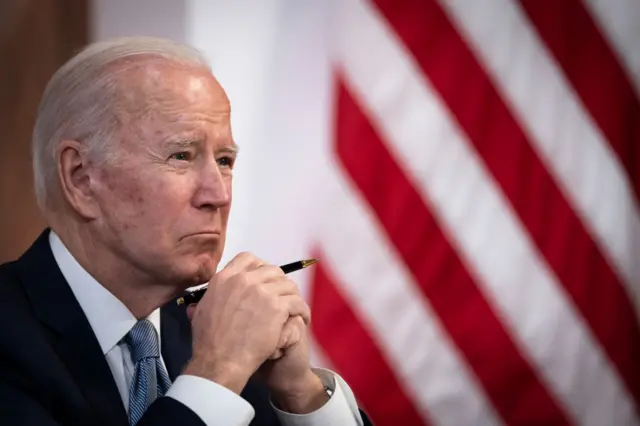 Joe Biden in front of US flag