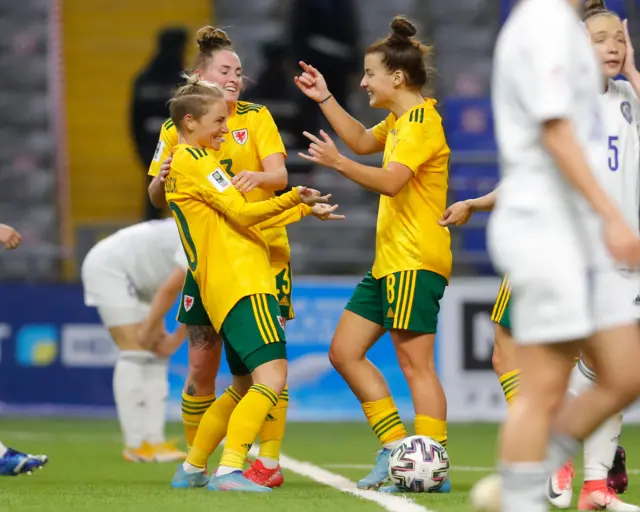 Jess Fishlock and Angharad James celebrate