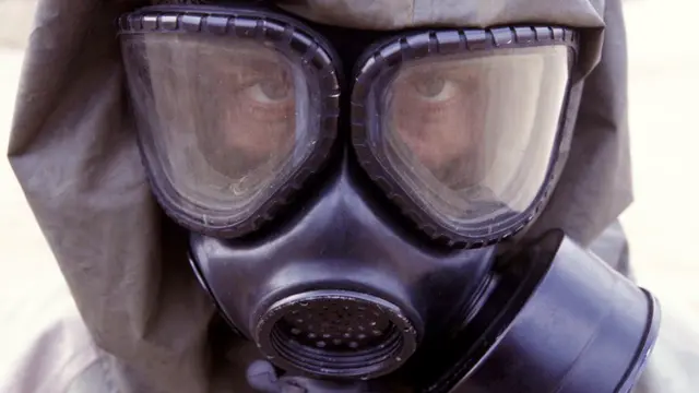 Person wearing a gas mask