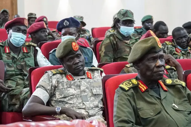 Members of South Sudan's armed forces attend a joint security meeting in Juba on 8 April 2022