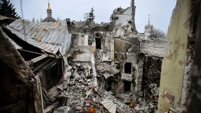 This picture shows the partially destroyed Mariupol drama theatre, bombed last March 16, in Mariupol on April 12, 2022