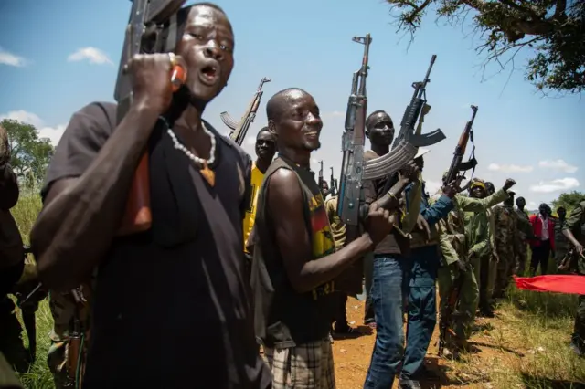 Rebels of the Sudan People's Liberation Movement-in-Opposition (SPLM-IO), a South Sudanese anti-government force, take part in a military exercise at a base in Panyume, on the South Sudanese side of the border with Uganda, on September 22, 2018