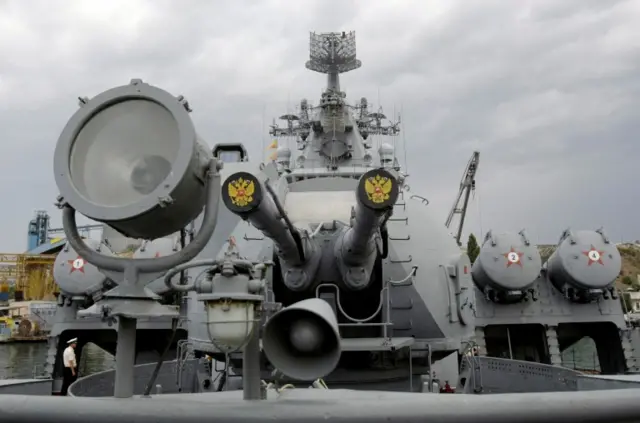 Russia"s coat of arms, the double headed eagle, is seen on covers of the missile cruiser Moskva in the Ukrainian Black Sea port of Sevastopol September 16, 2008.