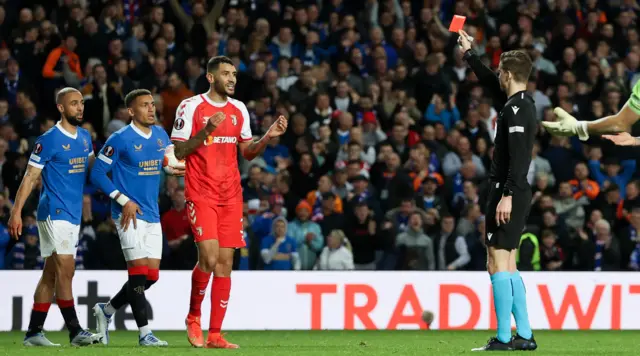 Vitor Tormena sees a red card for his challenge leading to the spot kick