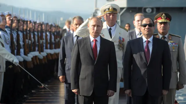 Russia's President Vladimir Putin and Egyptian President Abdel Fattah al-Sisi on board the Moskva