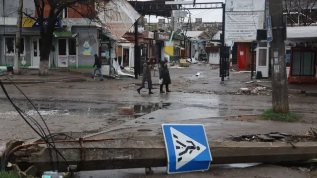 City residents walking in Mariupol