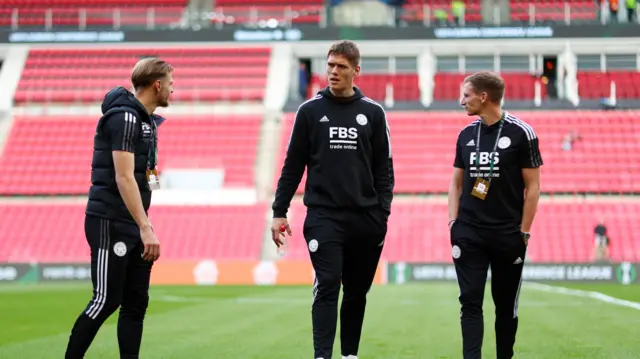 Leicester City players warm up