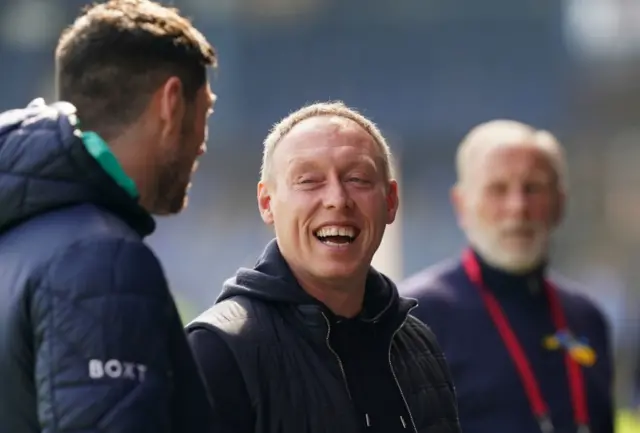 Nottingham Forest boss Steve Cooper shares a joke before his side face Luton