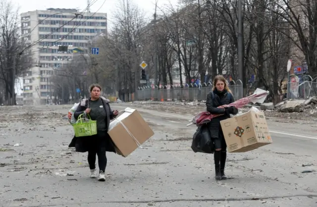 Women walking in Mariupol, Ukraine