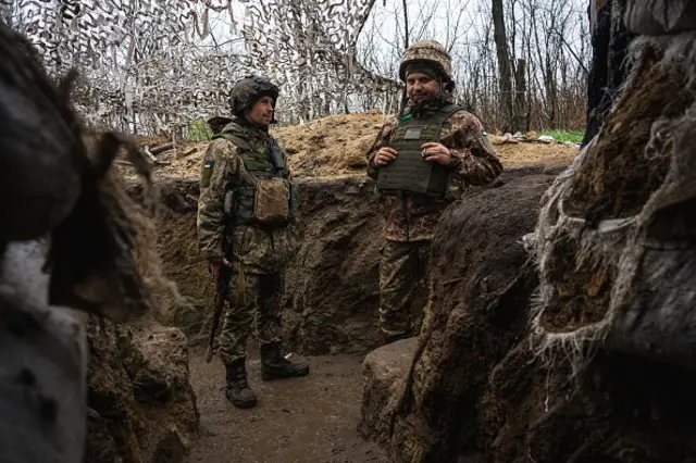 Ukrainian servicemen are seen on the frontline in Donbas, on 14 April 2022.