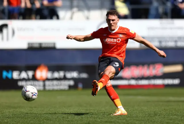 Kal Naismith converts a penalty for Luton