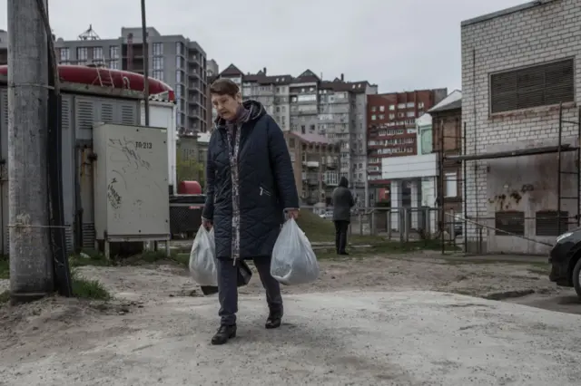 Civilians fleeing Donetsk and Luhansk take shelter in a hostel in Dnipro on 11 April