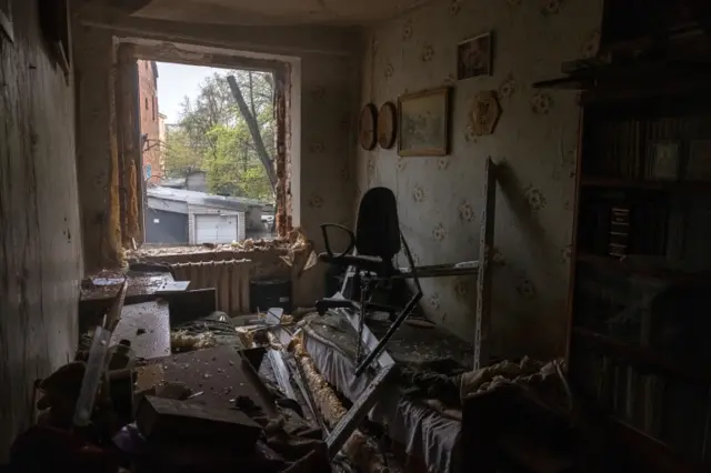 Damaged apartment in Kharkiv